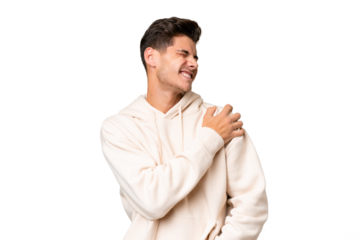 Young caucasian handsome man over isolated background suffering from pain in shoulder for having made an effort