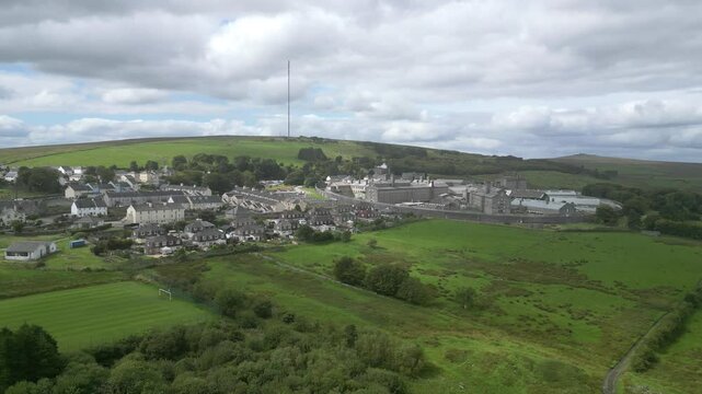 Princetown, Dartmoor National Park, Devon, England: DRONE VIEWS: The outskirts of the town of Princetown and HMP Dartmoor Prison. Princetown is a tourist hub for walkers traversing Dartmoor.