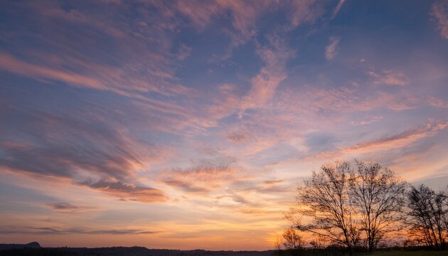 Colorful Sunset Sky with Dramatic Clouds - Powered by Adobe