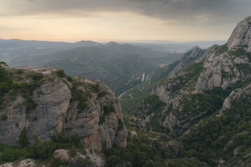 Montserrat mountain range in Spain near Barcelona in the Catalan Mountains. Mountain landscape with valley in the background.