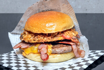 The true hamburger revolution came with the advent of **fast food