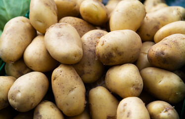 Pile of fresh potatoes in market