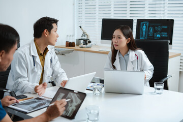 Medical team working on digital tablet healthcare doctor technology tablet using computer analyzed...