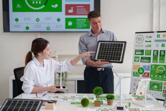 Sustainable Business Leaders Discuss ESG Strategies Green Technology Renewable Energy Solutions Carbon Reduction Initiatives - Powered by Adobe