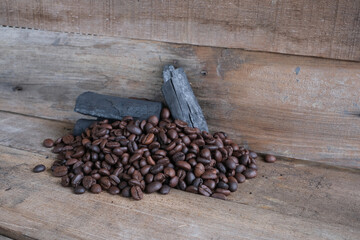 Coffee beans on a wooden background