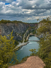 blue lake in the canyon.blue lake in the canyon. cloudy sky over the canyon