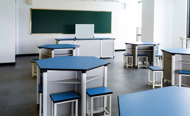 Modern classroom with hexagonal tables