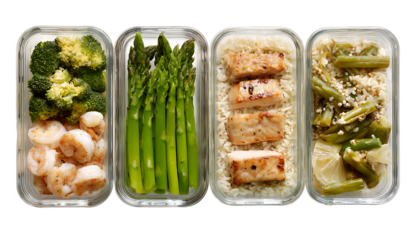 4 meal preps in glass containers with chicken, shrimp, and black beans. Top view, flat lay. Gourmet food concept for work or school lunch.