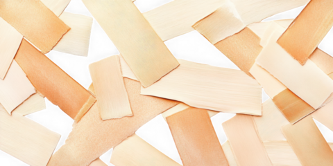 Scattered rectangles in shades of beige and peach on dark backdrop on transparent background