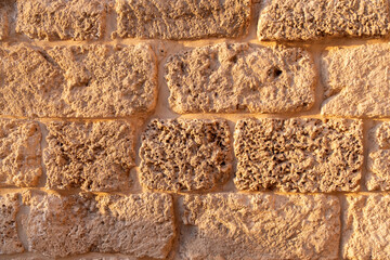large antique stones in ancient wall in caesarea. texture and texture of ancient stone