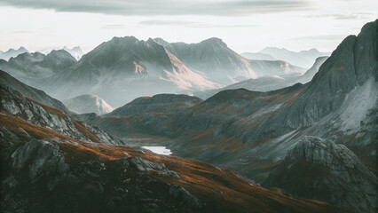 Majestic Mountain Landscape with Serene Lake and Hazy Sunlight