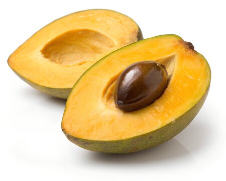 Half-Cut Lucuma Fruit Showing Yellow Flesh and Seed