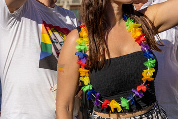 Close-up of woman wearing rainbow necklace