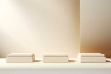 Minimalist beige product display stand with three empty square podiums on beige background with light beam