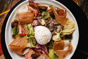 Colorful gourmet salad with fresh ingredients and toppings