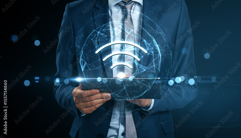 Poster Businessman using digital tablet with glowing wireless internet icon and abstract tech elements on dark background for online connectivity concept.