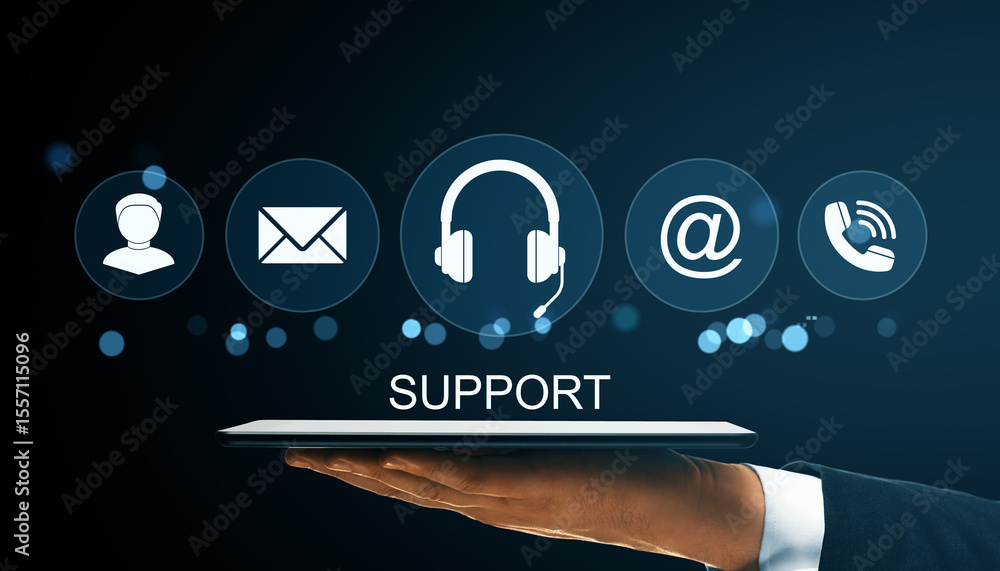 Poster Virtual customer support concept with communication icons such as email, call, and chat headset displayed above a digital device in hand on dark background.
