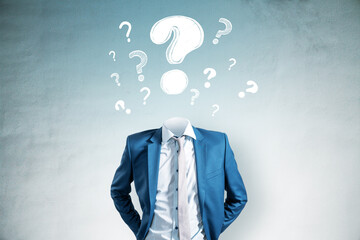 Businessman with no head and surrounded by question marks on blue to white gradient wall background...