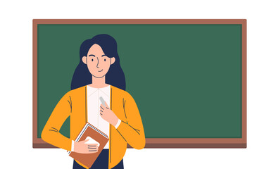 Young smiling woman teacher with chalk and a book in her hands stands at the blackboard.
