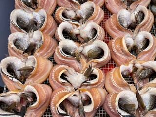 Sun-dried snakehead fish in Thailand local market, selective focus