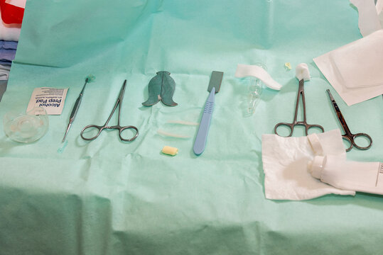 Tools and instruments for use by a mohel or ritual circumcisor p  including alcohol swabs and a knife, before performing a brit milah or circumcision on an eight-day old Jewish male baby.