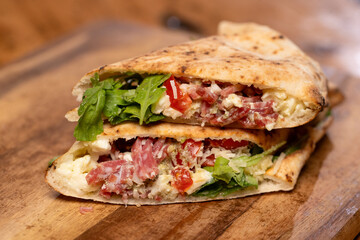 details of hot sandwich with italian salami