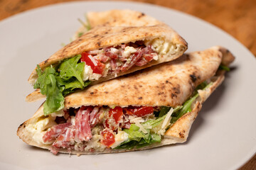 details of hot sandwich with italian salami