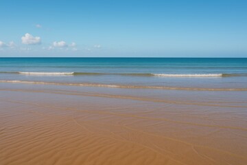 Obraz premium Receding Ocean Waters During Low Tide
