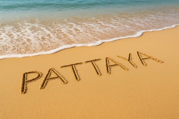 Fototapeta premium Beach sand featuring handwritten PATTAYA