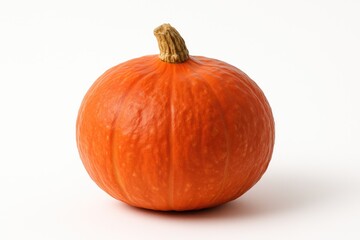 Obraz premium Orange Japanese pumpkin on a plain white backdrop