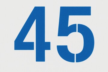 Obraz premium Forty-five in bold blue stencil on a white backdrop