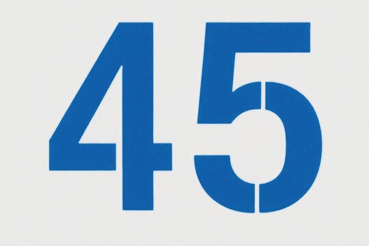 Forty-five in bold blue stencil on a white backdrop