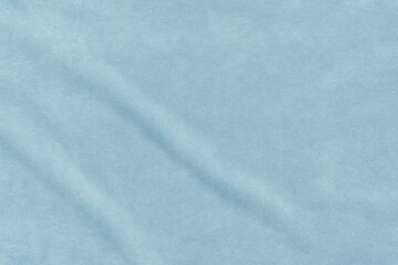 Obraz premium Soft light blue velvet surface with a smooth textile look and room for text