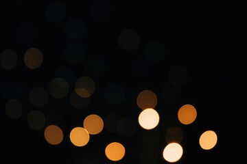 Fototapeta premium Vibrant circular glow with a blurred abstract background in dark tones