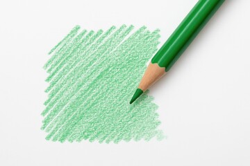 Green pencil shading on a white backdrop