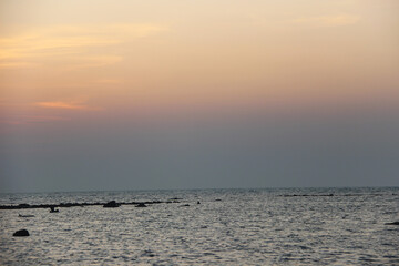 Serene Sunset Over Calm Ocean Waters