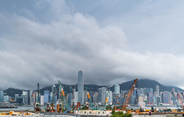 Construction site in Hong Kong , with modern skylines in the background