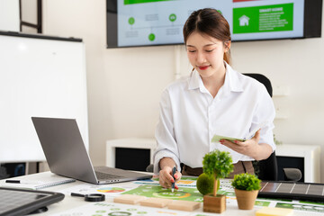People in Modern corporate work on renewable energy to representing ESG Enviromental, Social,...