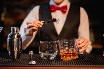 Bartender Serve Whiskey, on wood bar, 