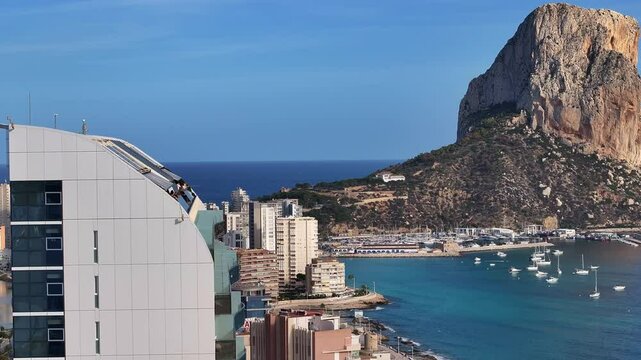 The calp coast with estimar hotel, beach, and surrounding landscape, aerial view