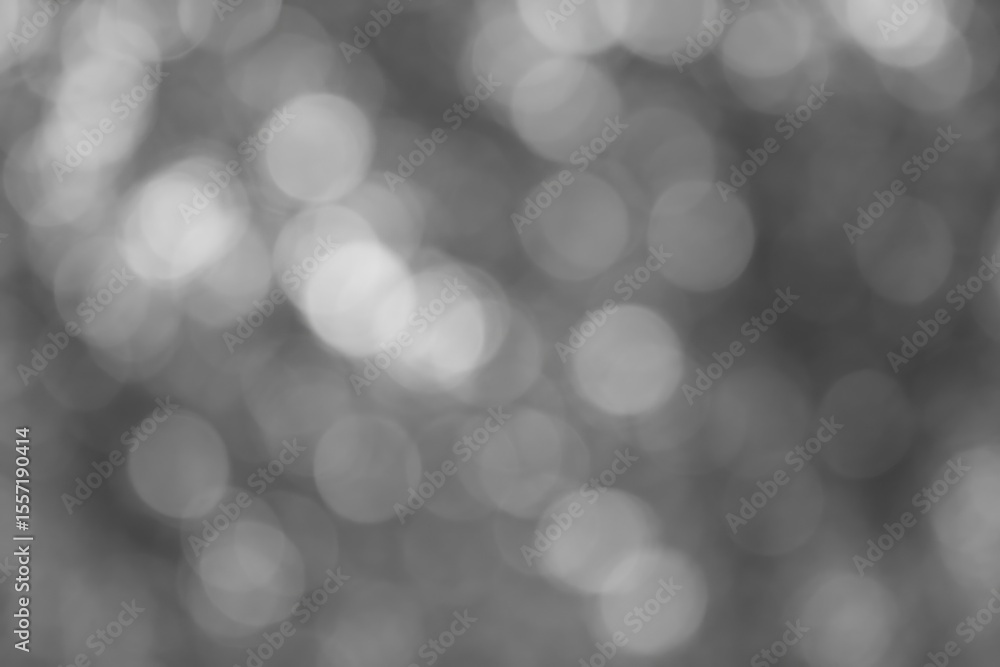 Poster Nature-inspired gray bokeh background with out-of-focus forest scenery