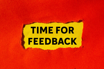 Time for feedback message written on ripped torn red paper on yellow background. Conceptual time...