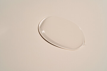 Clear gel streak on neutral beige, capturing its smooth glide and instant refreshment for serum...