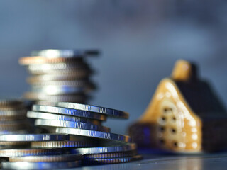 Home model in the concept of home mortgage, loan, saving money and finance.Selection focus.