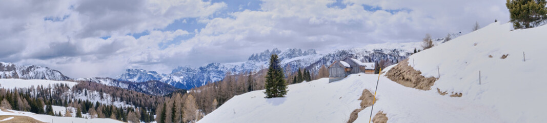 March 2025: winter landscape at Ski Area in Dolomites, Italy - Alpe Lusia. Ski resort in val di...