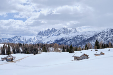 March 2025: winter landscape at Ski Area in Dolomites, Italy - Alpe Lusia. Ski resort in val di...
