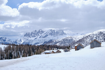 March 2025: winter landscape at Ski Area in Dolomites, Italy - Alpe Lusia. Ski resort in val di...