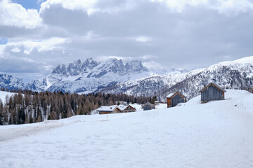 March 2025: winter landscape at Ski Area in Dolomites, Italy - Alpe Lusia. Ski resort in val di...