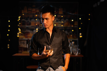  Closeup businessmen holding a glass of whiskey