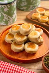 Bakpia is a flat round cookie, made from a mixture of green beans and sugar, then wrapped in flour...